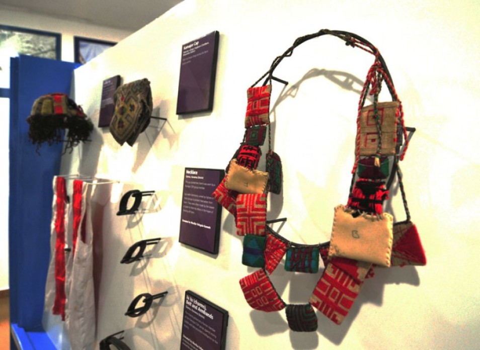 A necklace on display at a museum.