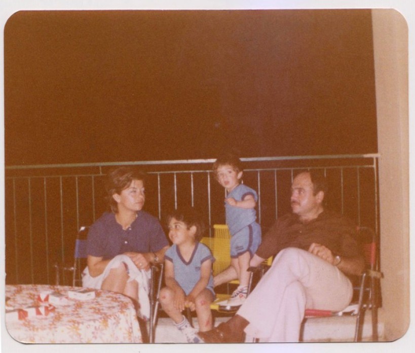 A family of four together.