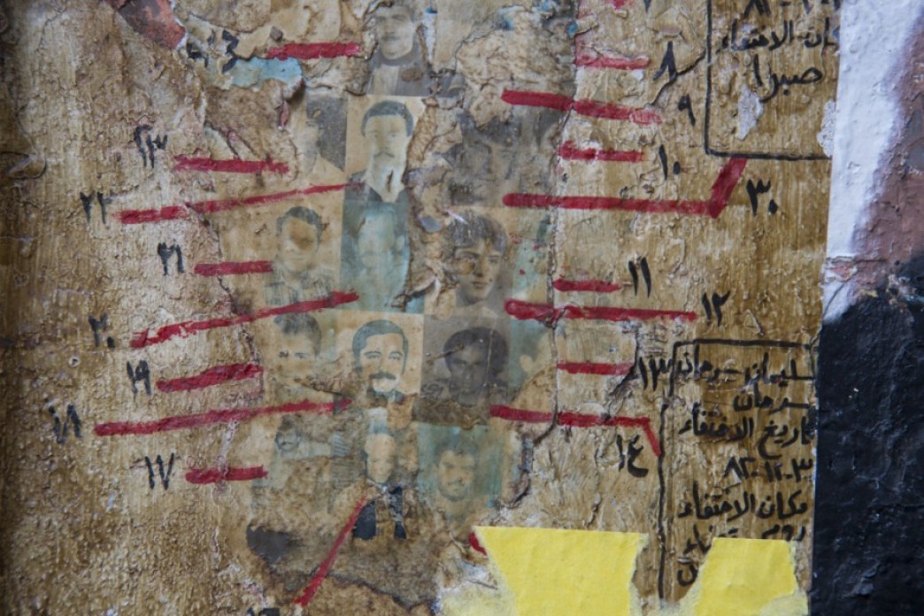 Aged posters for the disappeared on the streets.