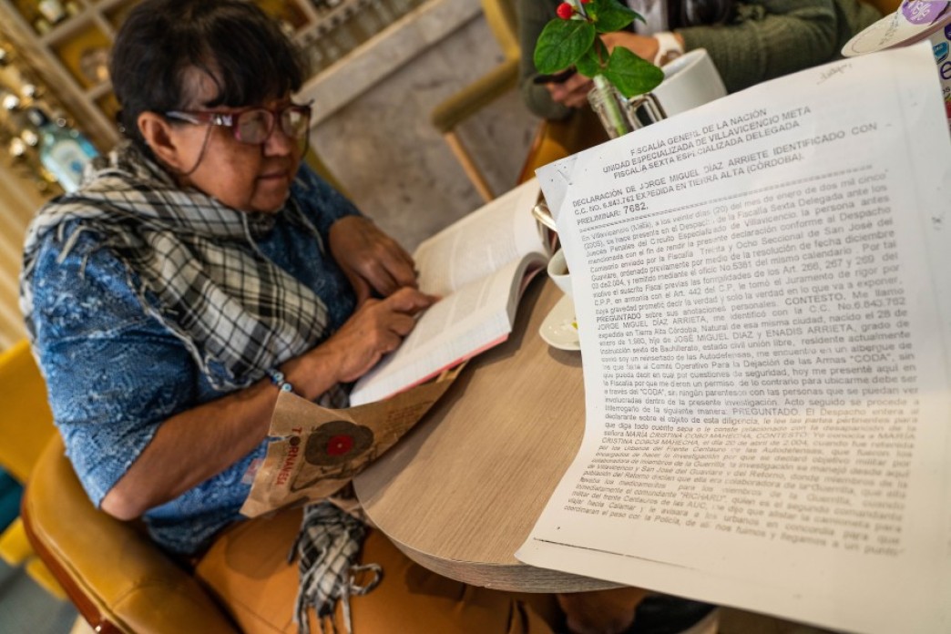 A woman reading documents.