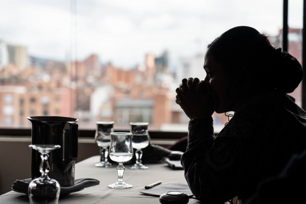 Woman at a table.